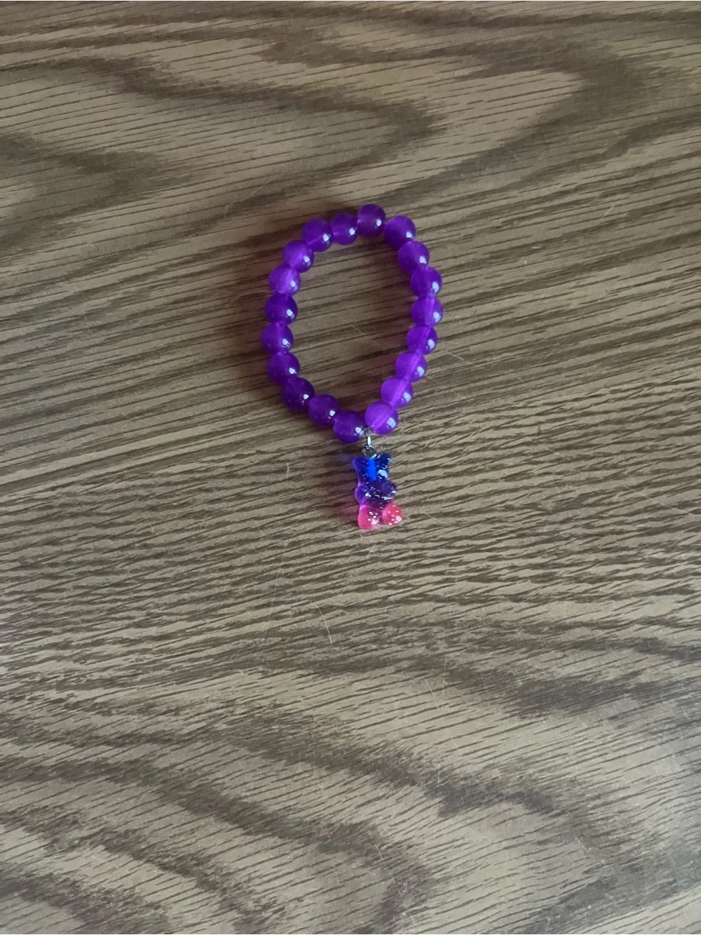 Kids Purple Beaded Bracelet with Blue and Pink Gummy Bear Charm